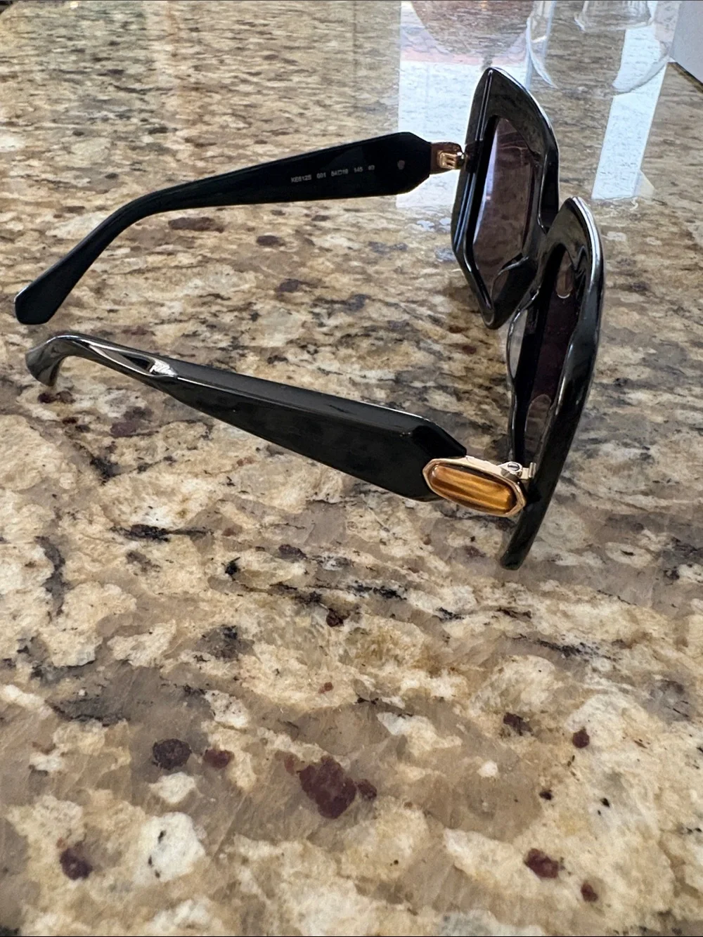 Kendra Scott Black Oversized Square Sunglasses with Pink Lenses